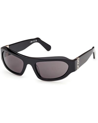 Gcds Stylische sonnenbrille schwarz glänzend wraparound