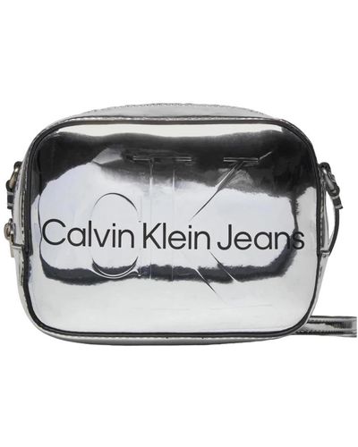 Calvin Klein Cross Body Bags - Metallic