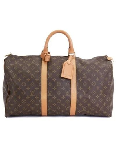 Louis Vuitton Pre-owned > pre-owned bags > pre-owned weekend bags - Marron