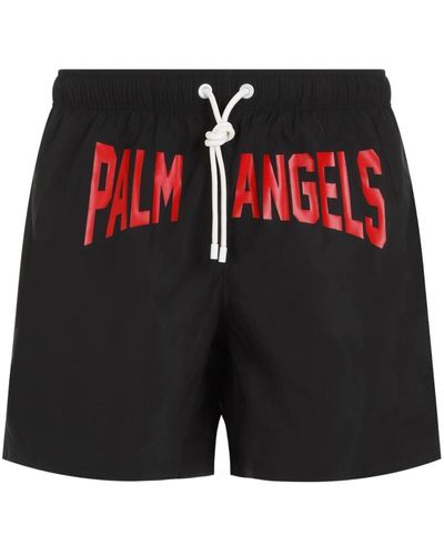 Palm Angels Schwarze badeshorts elastischer bund rotes logo