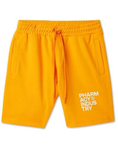 Pharmacy Industry Pantaloni in cotone arancione con stampa logo - Giallo