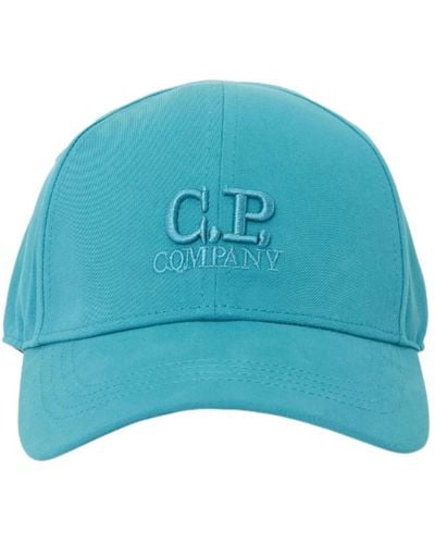 C.P. Company Blaue hüte mit schirm und besticktem logo