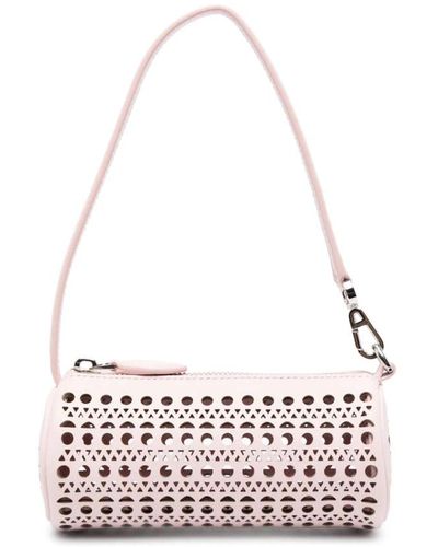 Alaïa Laser-cut rosa handtasche vienne motiv,hellrosa laserperforierte lederhandtasche - Pink