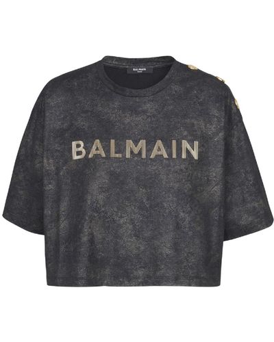 Balmain Cropped eco-responsible cotton T-shirt with textured logo print - Schwarz