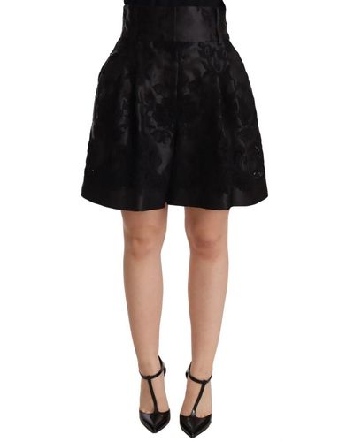Dolce & Gabbana Elegante falda negra de brocado floral de cintura alta - Negro