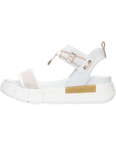 Nero Giardini Weiße sandalen für den sommer,schwarze sandalen stylischer sommer-look