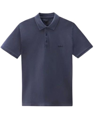 Woolrich Blaues polo-shirt mit besticktem logo
