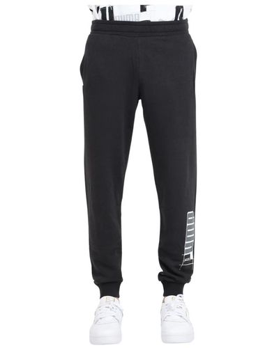 PUMA Pantaloni neri essentials+ logo lab sweatpants - Nero