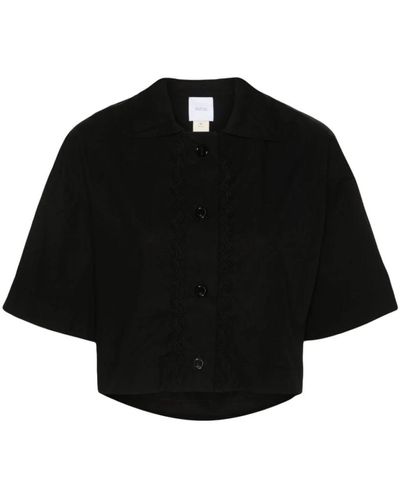 Patou Suéter crop negro con ondulación