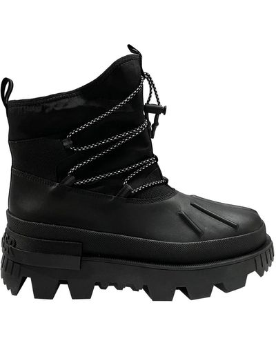 Moncler Shoes > boots > lace-up boots - Noir