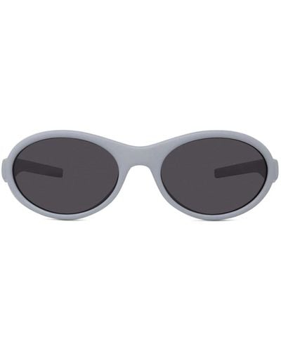 Givenchy Graue ovale sonnenbrille mit integrierten seitenschutz