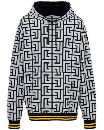 Balmain Kapuzensweatshirt aus Samt mit Maxi-Monogramm von - Schwarz