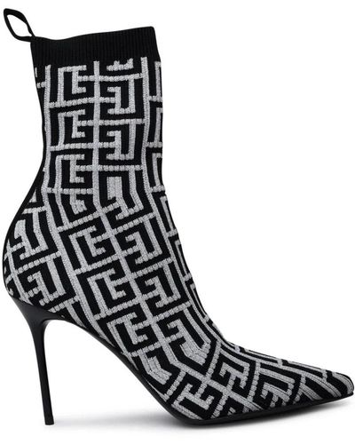 Balmain Skye stretch knit ankle boots with monogram - Schwarz