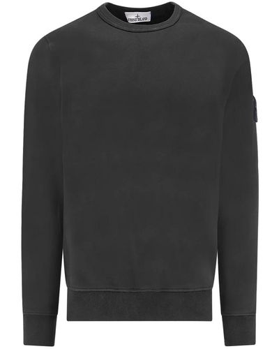 Stone Island Schwarzer sweatshirt mit geripptem rundhalsausschnitt