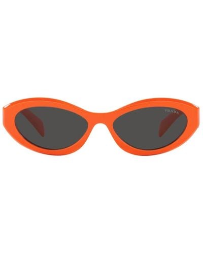 Prada Sonnenbrille mit unregelmäßiger form, farbenem rahmen und dunkelgrauen gläsern - Orange