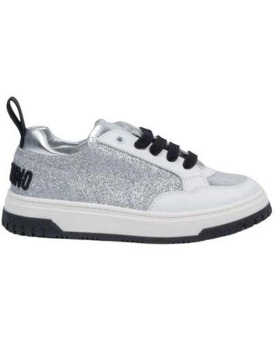 Moschino Weiße und silberne sneakers