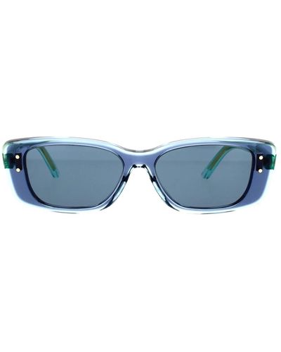 Dior Moderne transparente sonnenbrille mit blauem acetatrahmen und blauen verlaufsgläsern