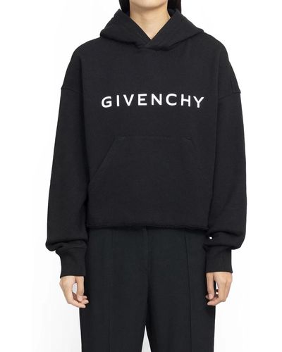 Givenchy Sudadera de algodón negra con capucha y bajo deshilachado - Negro