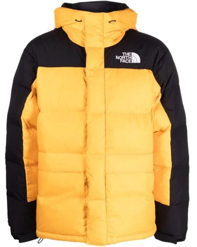 The North Face Down Jackets - Yellow