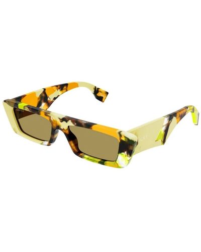 Gucci Stilvolle sonnenbrille in gelb mit braunen gläsern