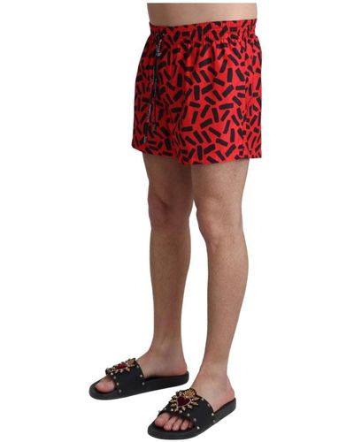 Dolce & Gabbana Rot gemusterte Beachwear Shorts Bademode