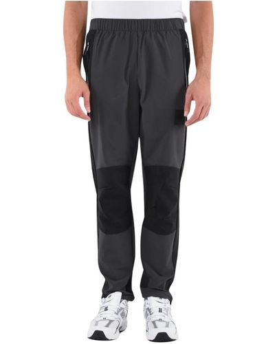 The North Face Trousers > sweatpants - Gris