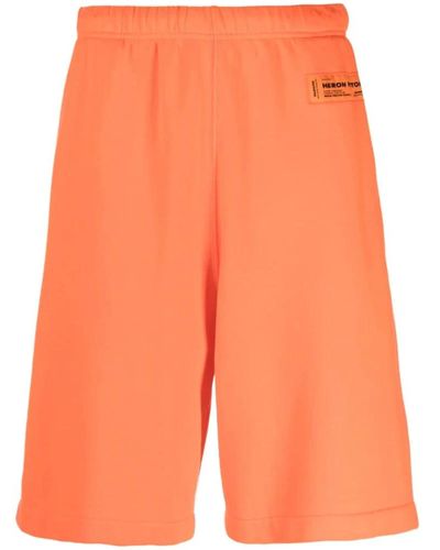 Heron Preston Shorts logo arancioni stile casual - Arancione