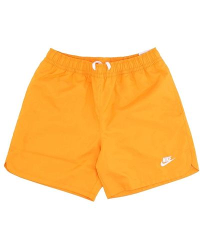 Nike Gewebte gefütterte flow shorts - Orange