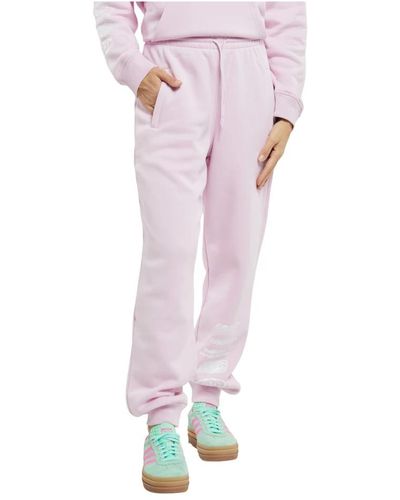 adidas Originals Pantalone con vita elastica e tasche con zip - Rosa