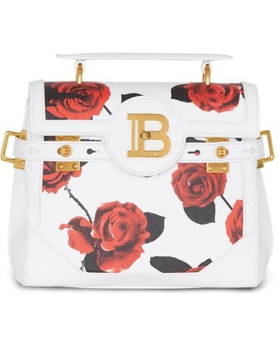 Balmain Tasche b-buzz 23 aus kalbsleder mit rosen-print und eingeprägtem grid-muster - Weiß