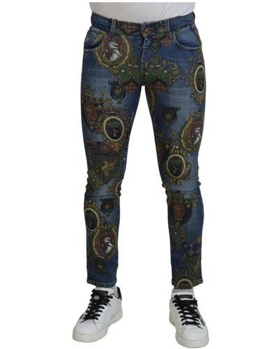 Dolce & Gabbana Jeans in cotone slim fit con stampa medaglia blu