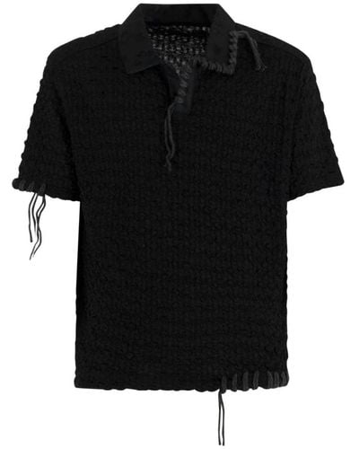 ANDERSSON BELL Polo Shirts - Black