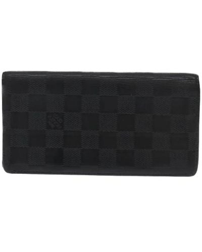 Louis Vuitton Pre-owned > pre-owned accessories > pre-owned wallets - Noir