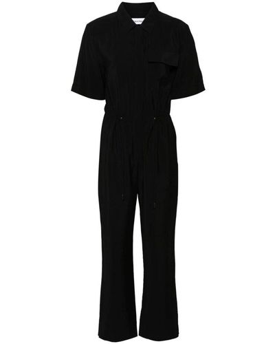 Calvin Klein Mono negro texturizado con bolsillos