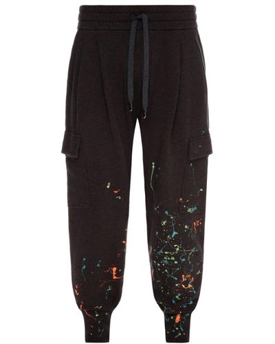 Dolce & Gabbana Cargo sweatpants mit farbspritzern - Schwarz