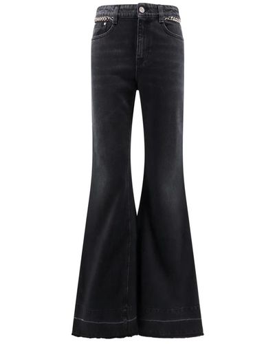 Stella McCartney Flared boot-cut jeans con falabella chain - Negro