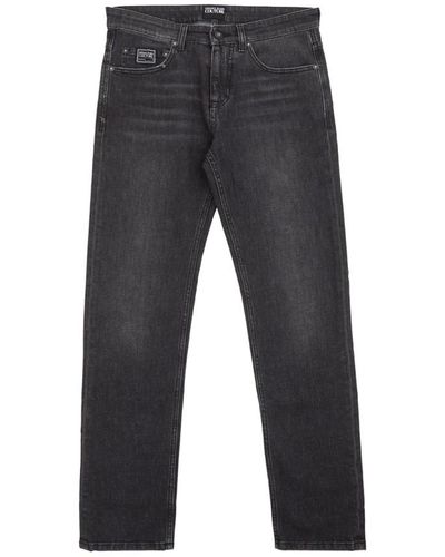 Versace Schwarze gewaschene slim fit jeans - Grau
