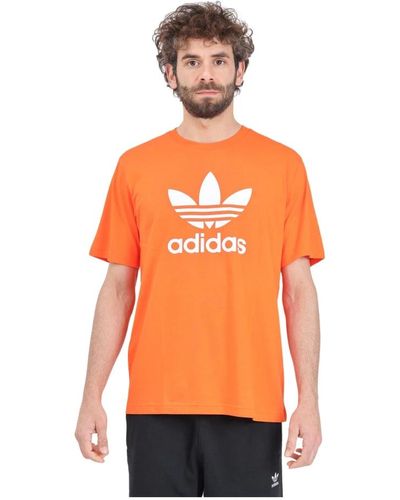 adidas Originals T-shirt adicolor trefoil arancione e bianca