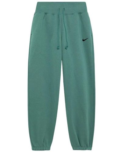 Nike Phoenix fleece sweatpants mit gesticktem logo - Grün