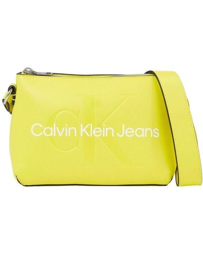 Calvin Klein Cross Body Bags - Yellow