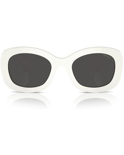 Prada Elegante ovale sonnenbrille mit dicken bügeln - Braun