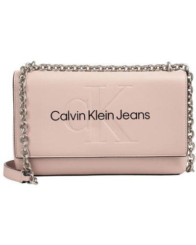 Calvin Klein Cross Body Bags - Pink