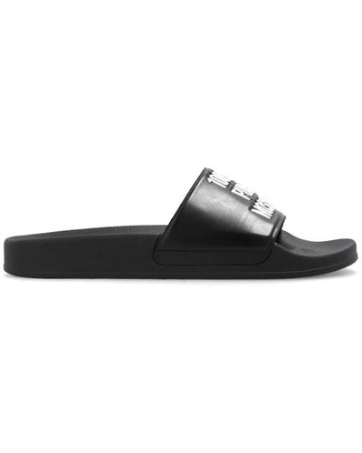 Moschino Shoes > flip flops & sliders > sliders - Noir