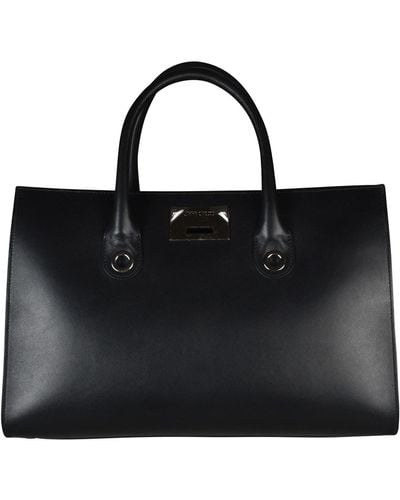 Luxury bags for men - Jimmy Choo Derek in black leather with stars
