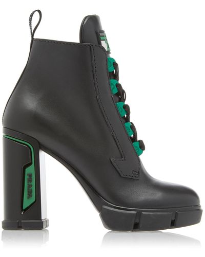 Prada Tronchetti Leather Ankle Boots - Black
