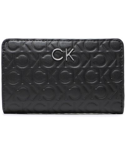 Calvin Klein Große Damen Geldbörse Re Lock Bifold Wallet Emb Mono K60K610240 - Schwarz