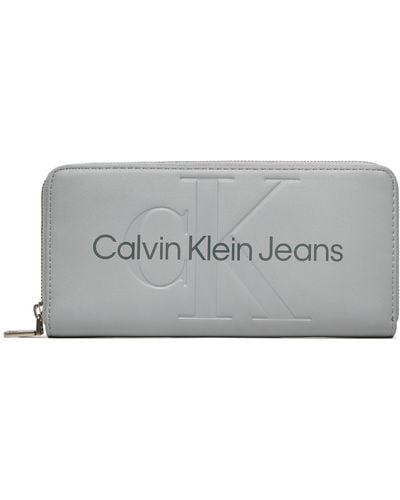 Calvin Klein Große Damen Geldbörse Sculpted Zip Around Mono K60K607634 - Grau