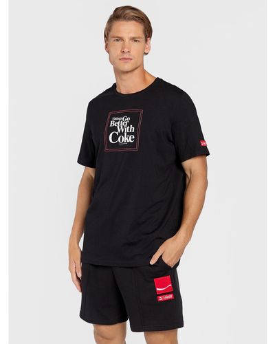 PUMA T-Shirt Coca-Cola Graphic 536158 Regular Fit - Schwarz