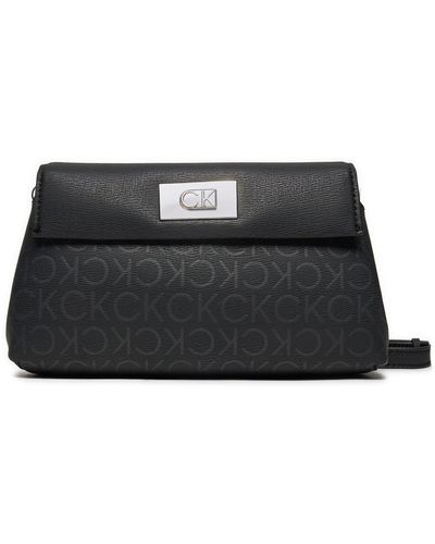 Calvin Klein Handtasche Fully Stuffed Flatpack K60K612634 - Schwarz