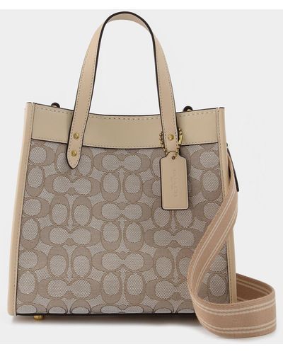COACH® Official Site - Designer Handbags, Wallets, Clothing, Menswear,  Shoes & More